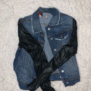 Leather sleeve jean jacket.
